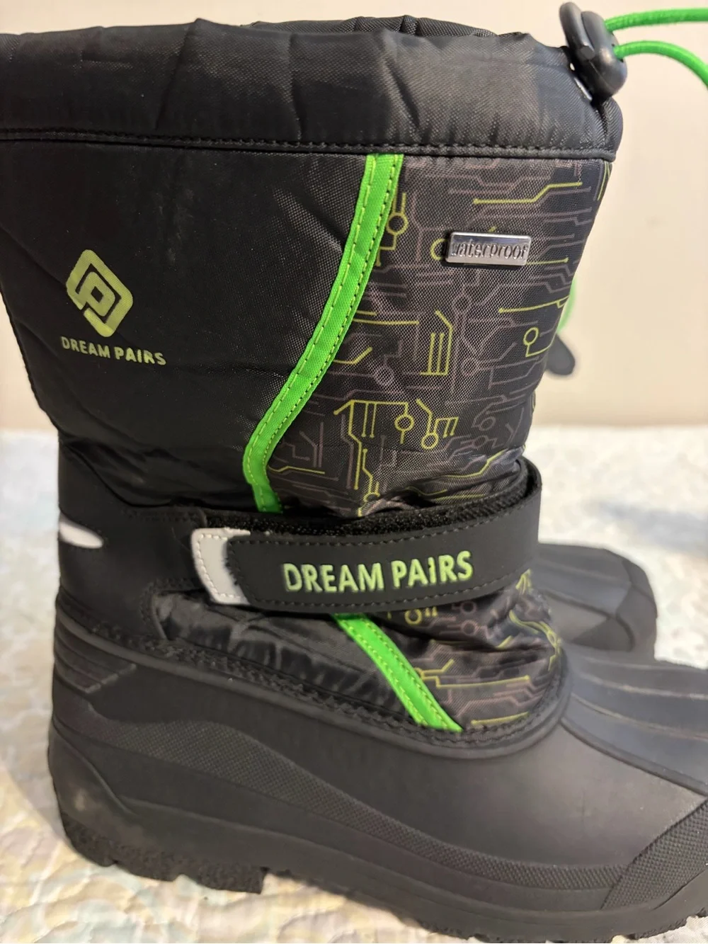 Dream Pairs Black Snow Boots with Neon Green Tech Style Accents
